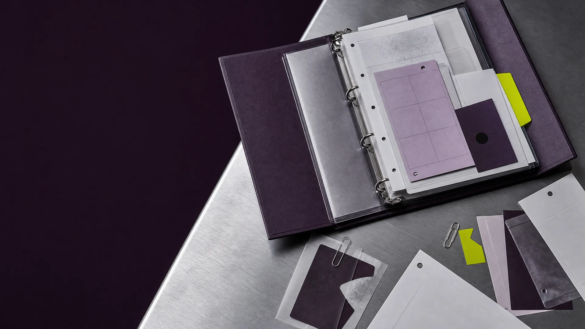 Career evidence binder on an aluminium archive table