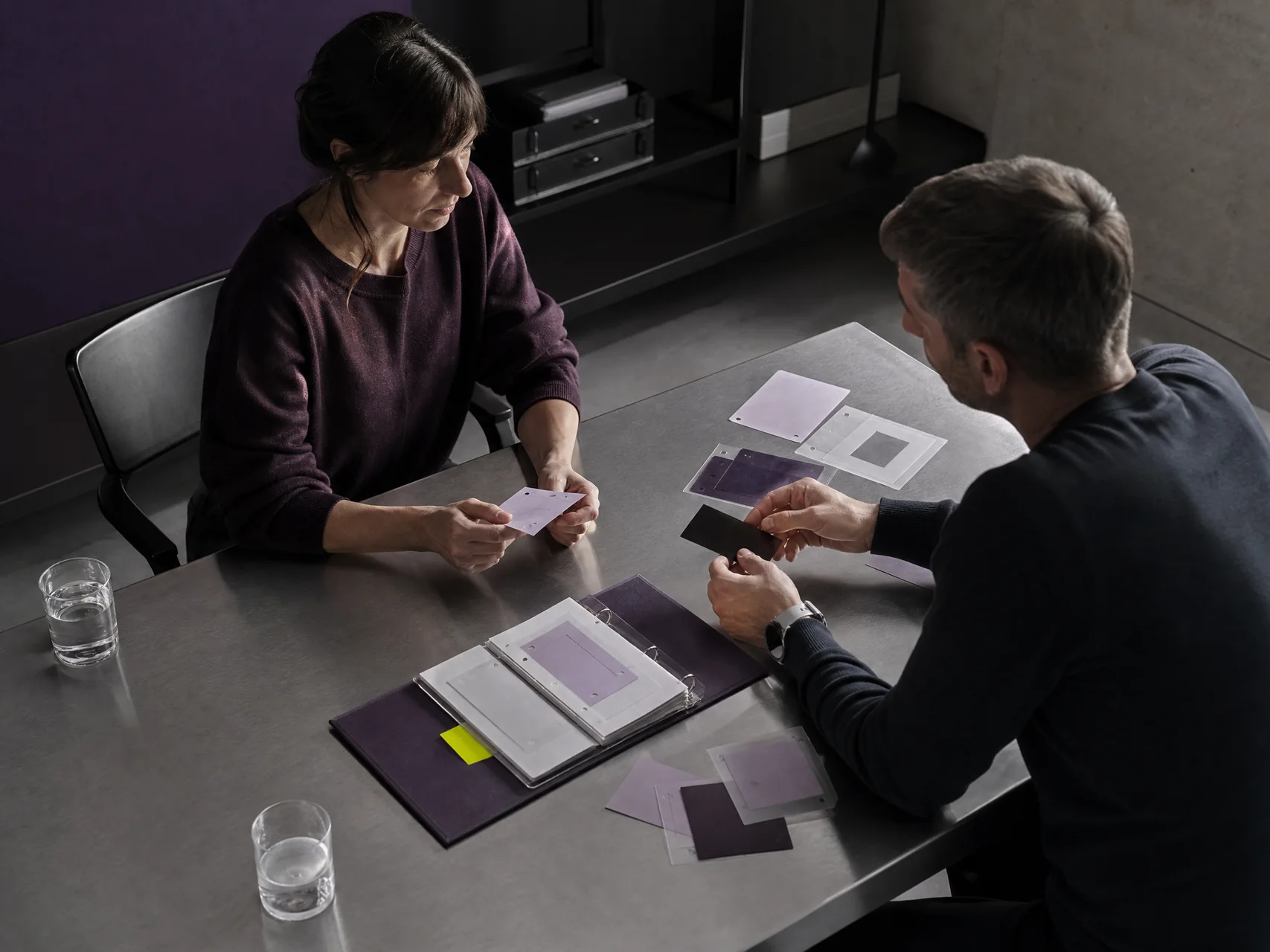 Quiet mentoring room with two chairs and an evidence sleeve